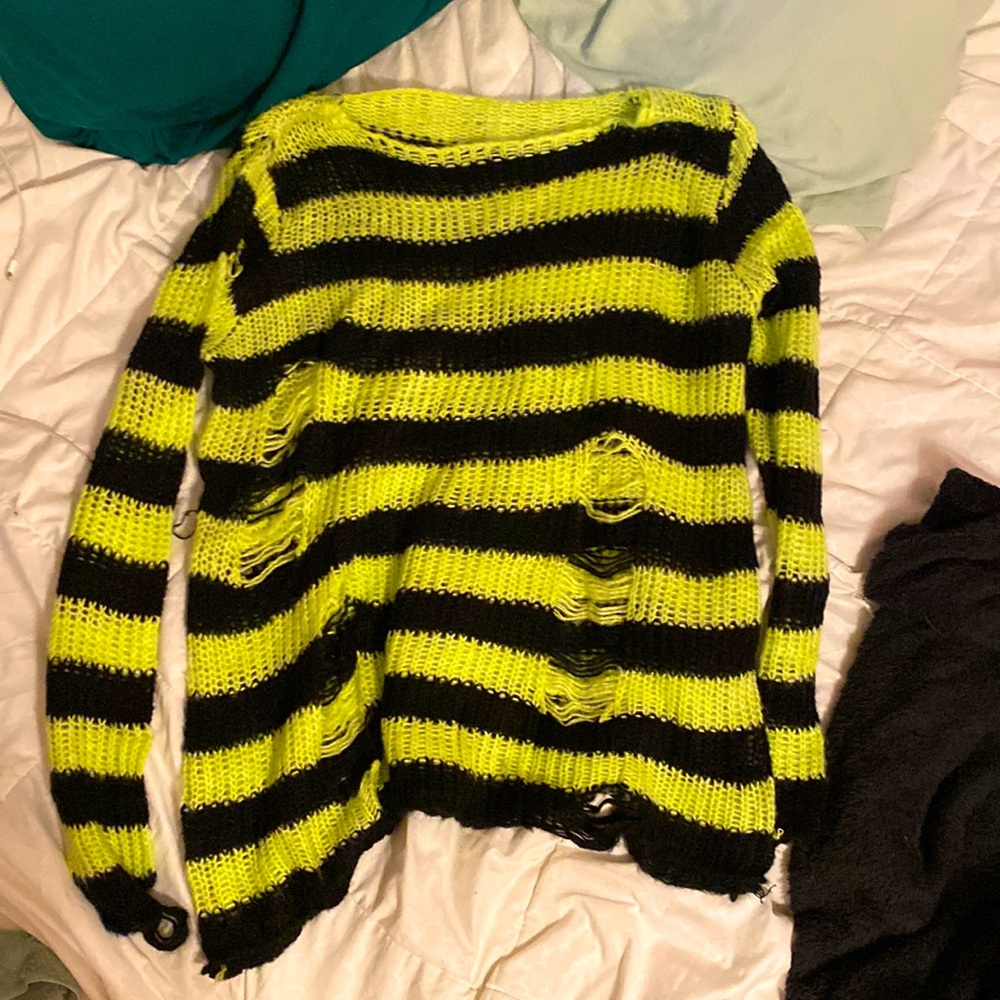Green and black purposefully ripped soft sweater